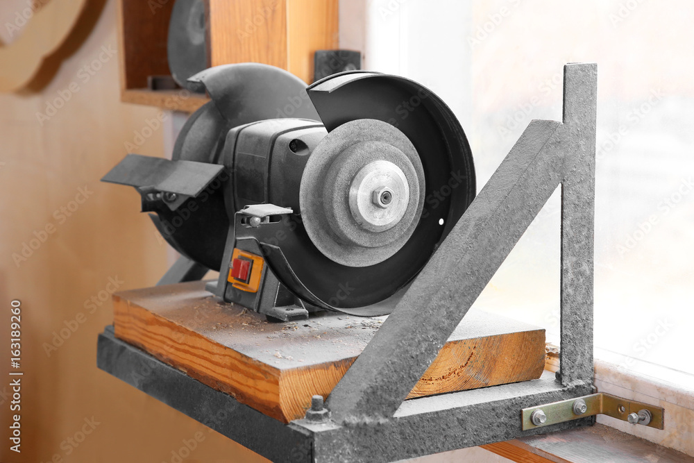 Circular saw in carpenter's workshop