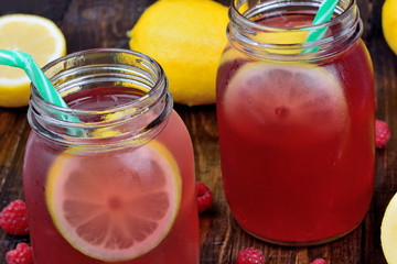 Canvas Print - Raspberry lemonade in a glasses jar on table