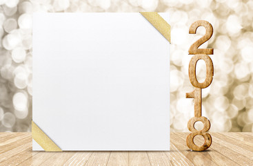 Aufkleber - Happy new year 2018 with blank white greeting card with gold ribbon in perspective room at sparkling bokeh wall and wooden plank floor,leave space for display of design