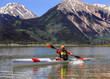 Man is racing in a kayak