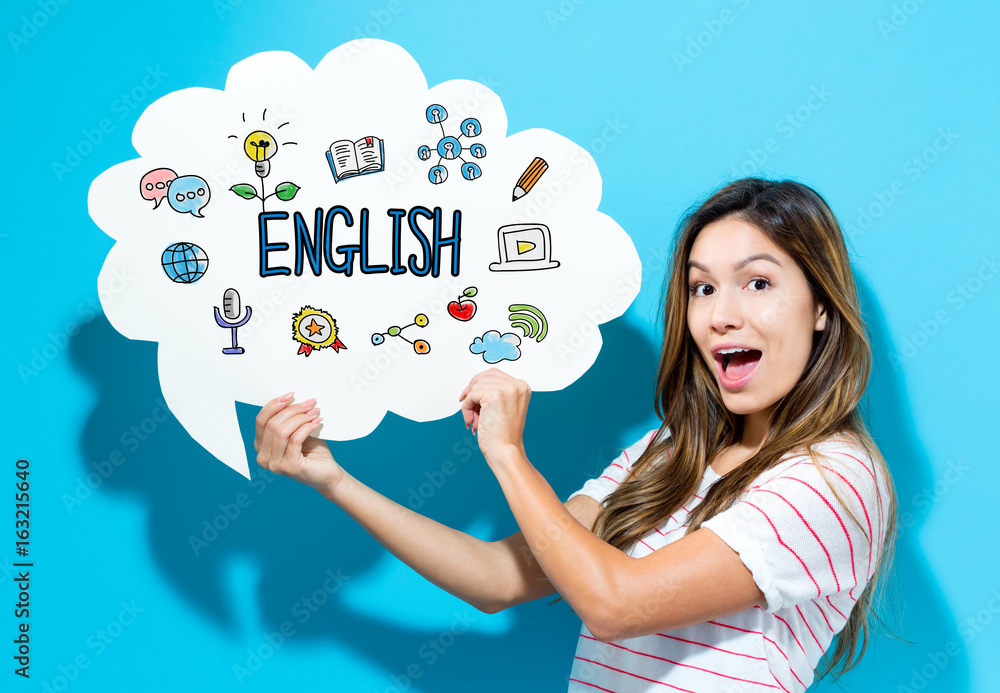 Photo English text with young woman holding a speech bubble on a blue background