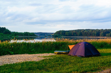 Wall Mural - camping tent near a lake