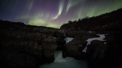 Wall Mural - bright aurora northern lights barnafoss volcanic lava field waterfall moonlight iceland 4k