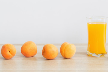 peach juice on wooden table