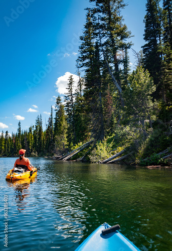 Fotografie, Obraz kayaking on Lake Jenny in Grand Tetons National Park