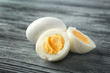 Hard boiled eggs on wooden background. Nutrition concept