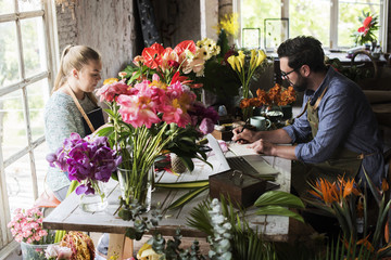 Flower shop business owner working service