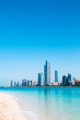 Beach and the city of Abu Dhabi