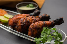Chicken Tangri Kabab Or Kebab - Three Chicken Leg Pieces Marinated With Red Sauce Then Grilled And Served With Salad. It Can Be Served With Green Chutney