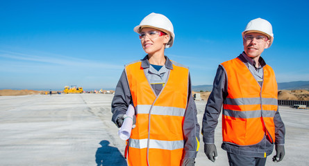 two engineers at airport runway