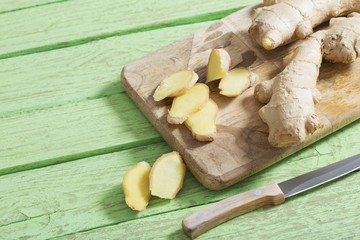 Wall Mural - Ginger on wooden background