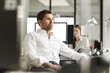 © Westend61 - Businessman at desk in office