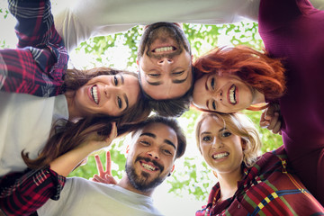 group of young people together outdoors in urban background