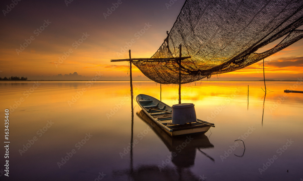 the boat during wonderful sunrise at jubakar,kelantan malaysia on 4 nov. 2016