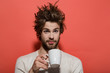 © Volodymyr - morning refreshment of surprised man with cup of tea, coffee