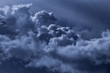cloudy night sky with stars