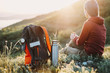 © Alex Photo - Female hiker rests in the mountains.