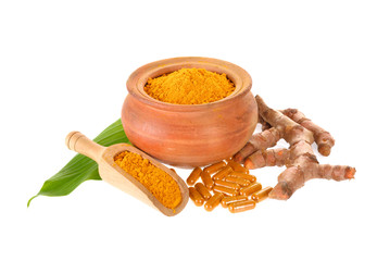 Wall Mural - Turmeric powder and capsule on white background