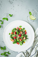 Wall Mural - Salad with kale, strawberries, quinoa and mint leaves