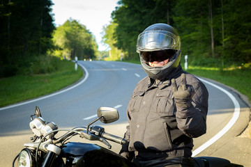 Biker shows the middle finger