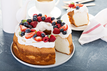 Angel food cake with whipped cream and berries