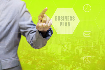 Wall Mural - BUSINESS PLAN word on touchscreen with futuristic concept.