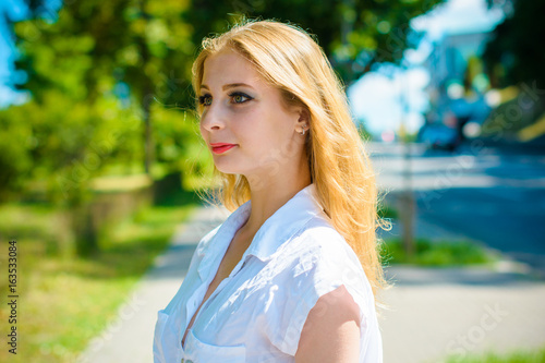 Young Sweet Blonde Girl In Casual Style Walk In Park And Feeling Beautiful Young Sweet Blonde Girl In Casual Style Walk In Park And Feeling Beautiful