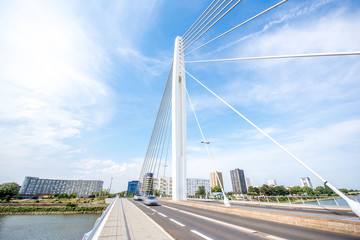 View on the modern bridge with beautiful sky in Nantes city in France