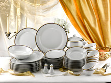 Elegant Set Of  Porcelain Plates  Ready For A Buffet Dinner