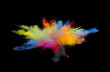 Multi color explosions of powder paint create abstract forms in front of a black background giving off fantastic colors formations.