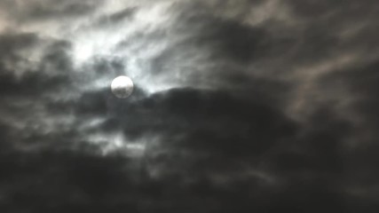 Wall Mural - sun or full moon time lapse on stormy sky