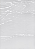 Transparent crumpled plastic packing texture background
