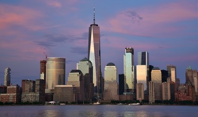 The Freedom Tower, World Financial Center, and the skyline of downtown Manhattan from Jersey City at sunset.