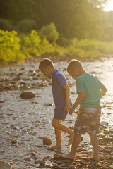 kids have fun in river