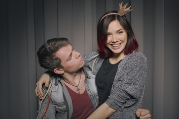 Wall Mural - Happy couple in a photo booth