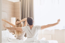 Young Couple Travel Together Hotel Room Leisure