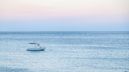 Poster - boat in sea in blue summer evening