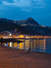 Canvas Print - urban beach in Giardini Naxos town in summer night