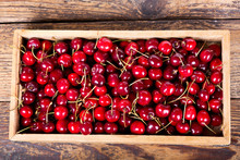 Fresh Cherries In Wooden Box