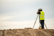 © bannafarsai - survey engineer in construction site use theodolite mark a concrete pile co ordinate