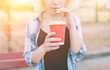 © estradaanton - Girl drinking coffee, paper glass