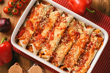 Enchiladas - Mexican Food, Tortilla With Chicken, Cheese And Tomatoes.