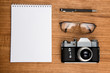 © masyuk1989 - an old camera is a notebook and pen