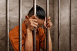 © fotokitas - Asian man in prison