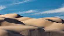 Sand Dunes With Blue Sky