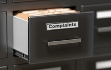 Complaints Files And Documents In Cabinet In Office. 3D Rendered Illustration.