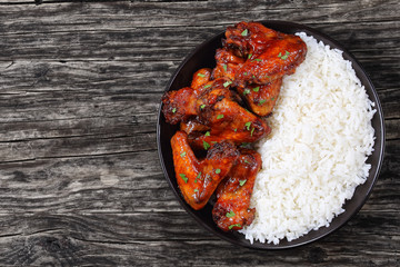 Wall Mural - rice with delicious glazed chicken wings