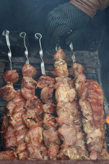 Wall Mural - meat skewers on the barbecue coals