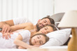 © realstock1 - The happy family sleeping on the comfortable bed