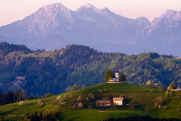 Church of St Thomas at Praprotno, with Kamnik Savinja alps in the background